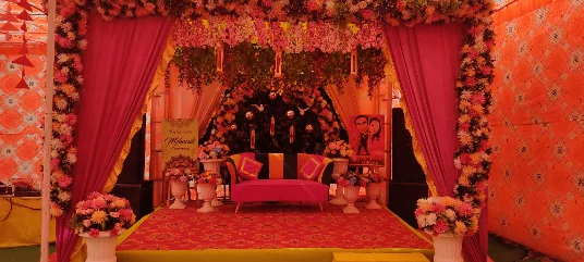 Wedding stage with floral canopy